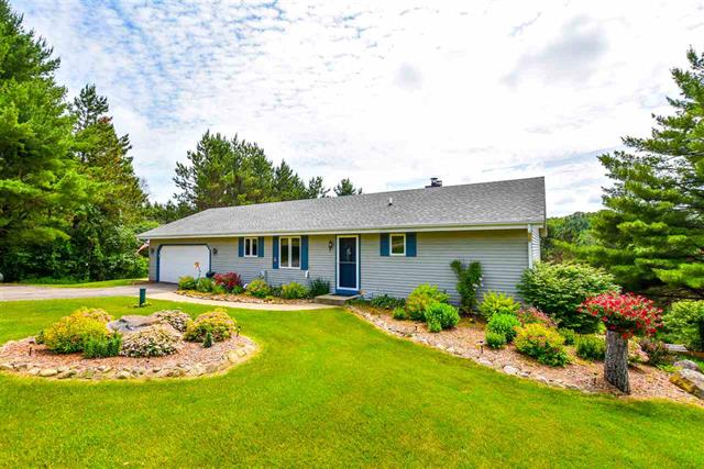 home on a hill with garden